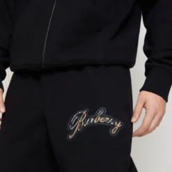 Check Cursive Logo Cotton Jogging Pants