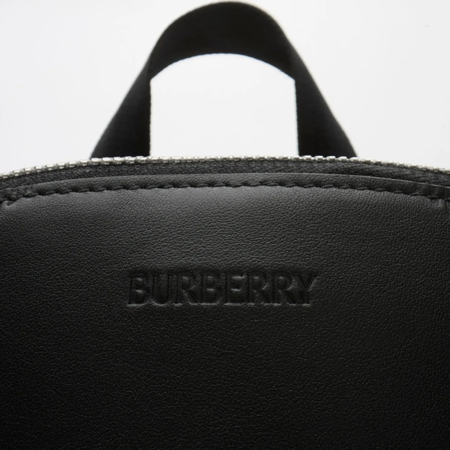 Embossed Check Backpack